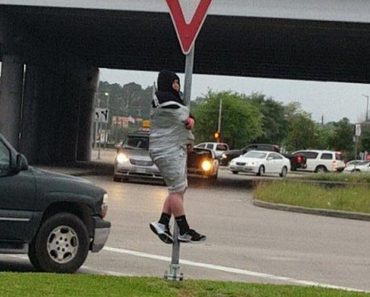 Police Arrive To Scene To See Man Duct Taped To Traffic Sign